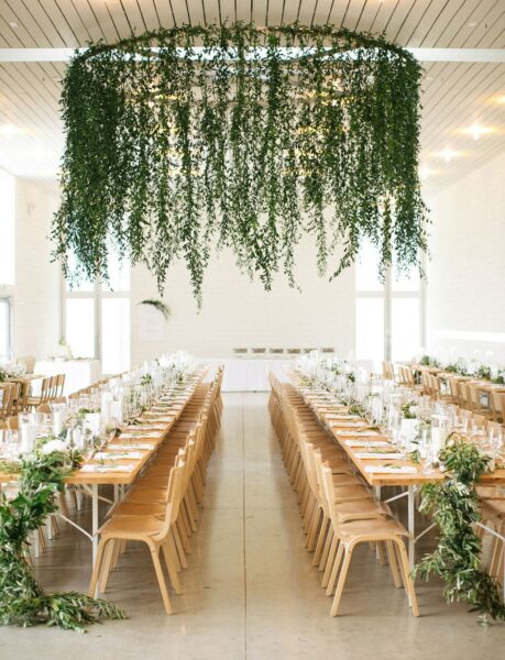 Greenery Wedding Decor hanging from ceiling and on tables