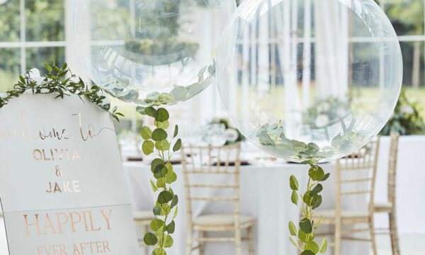 Greenery and balloon wedding decor