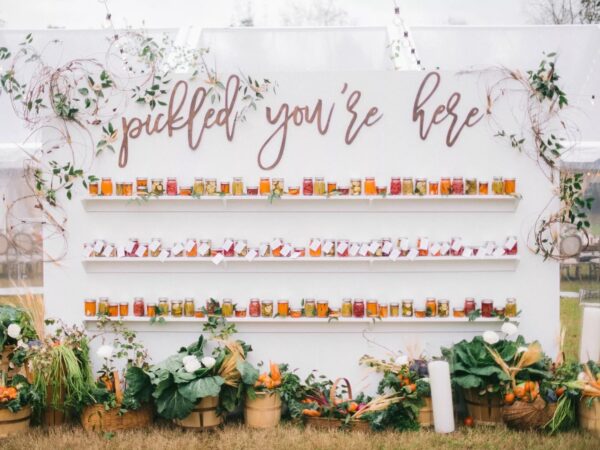 wall with pickled vegetables in jars